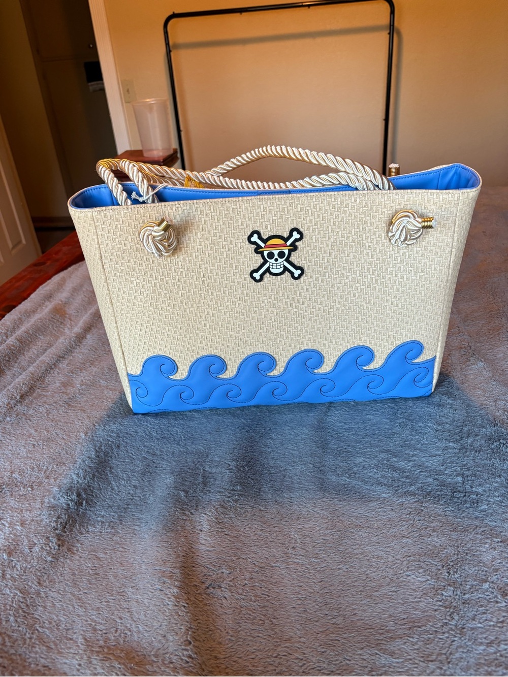 One Piece Tote Bag with Blue Wave Accent and Patch